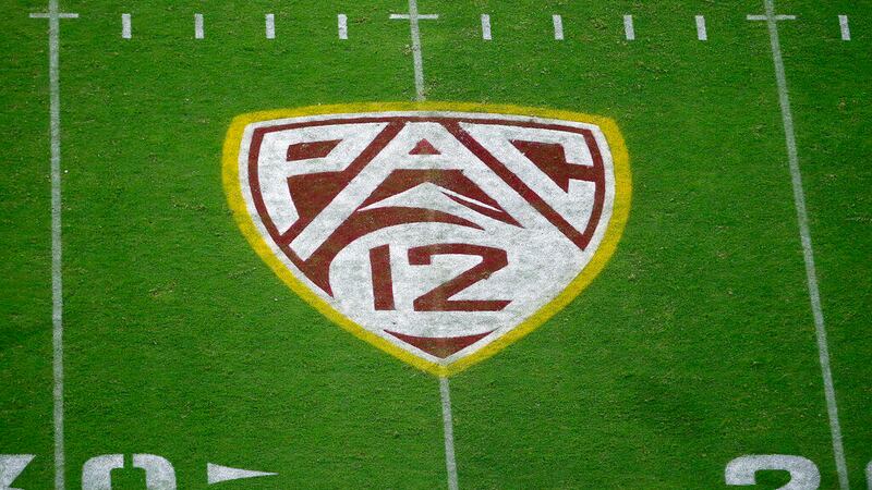 FILE - In this Aug. 29, 2019, file photo, the Pac-12 logo is displayed on the field at Sun...