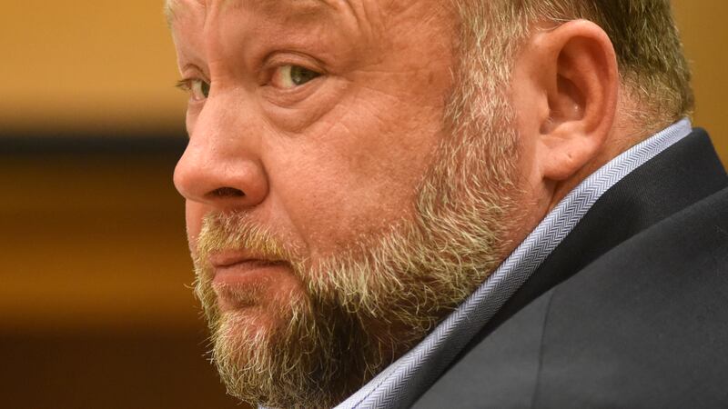 FILE - Infowars founder Alex Jones appears in court to testify during the Sandy Hook...