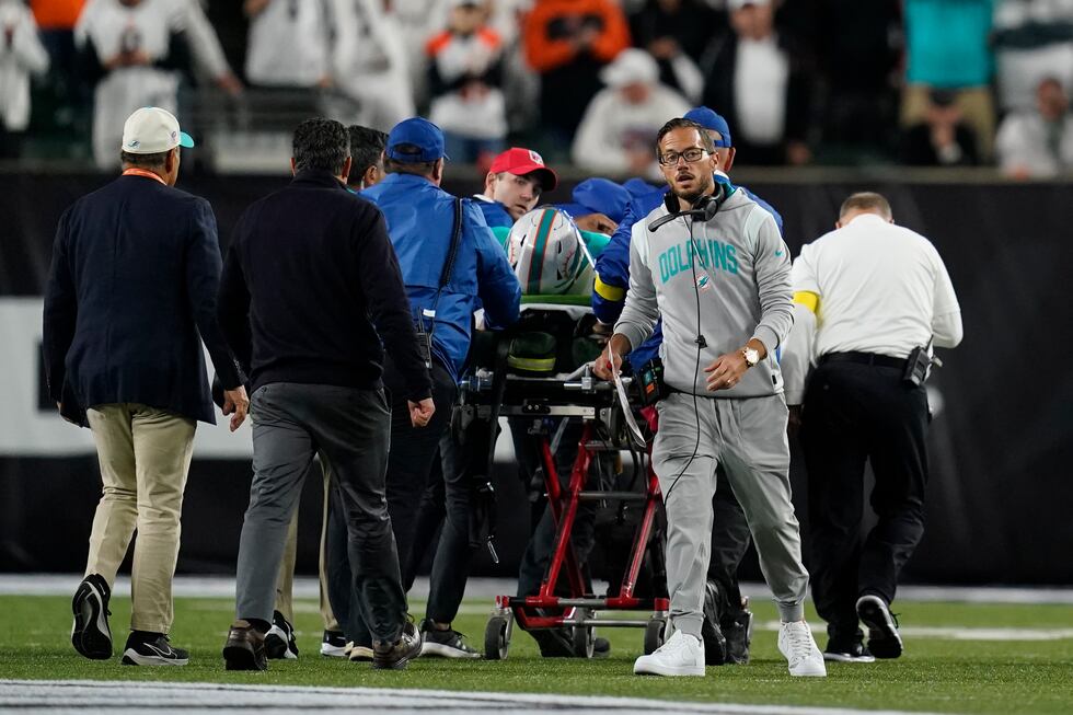 Miami Dolphins quarterback Tua Tagovailoa is taken off the field on a stretcher during the...