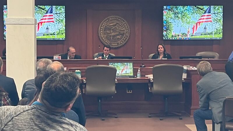 From left to right facing camera, Reps. Hugh Bartels (R-Watertown), Will Mortenson (R-Pierre),...