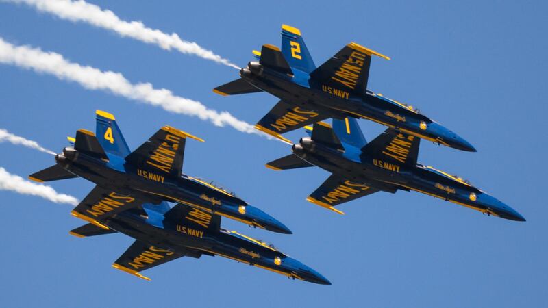 The U.S. Navy Flight Demonstration Team Blue Angels perform aerobatic maneuvers for spectators...