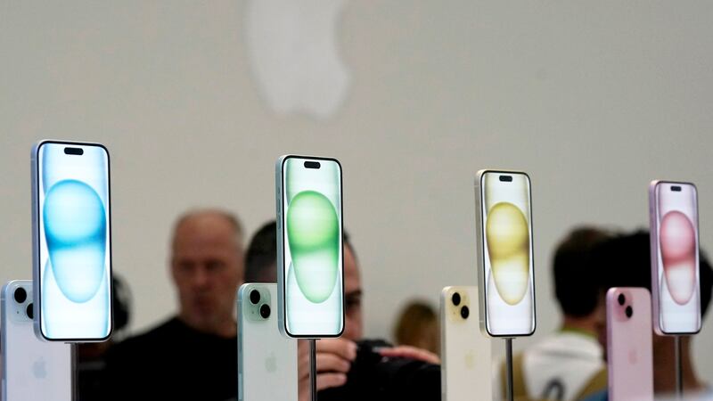 FILE - The iPhone 15 phones are shown during an announcement of new products on the Apple...