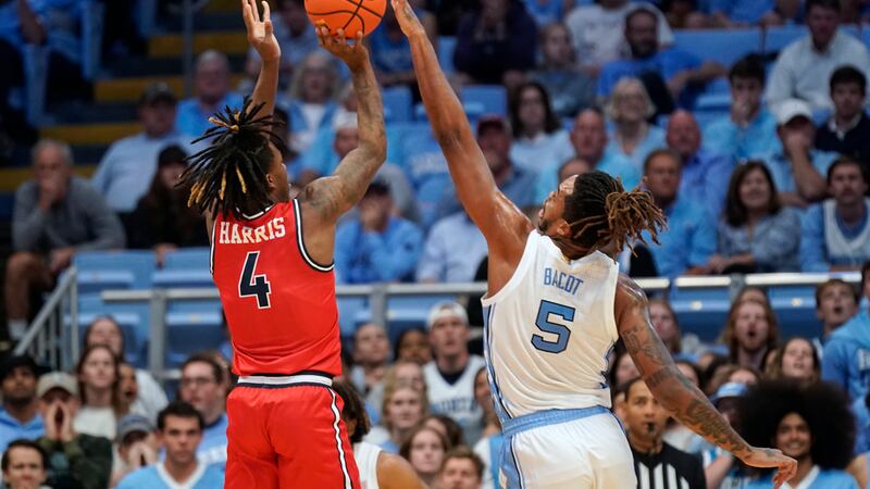 North Carolina forward Armando Bacot (5) blocks a shot by Radford guard Truth Harris (4)...